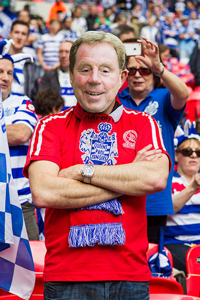 Play Off: A Queens Park Rangers fan wearing a mask of manager Harry Redknapp