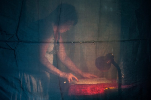 A voter fills in a ballot in a booth at a polling station in Dobropillia, Ukraine. Ukraine is voting for a new president despite spiralling violence in the east of the country.