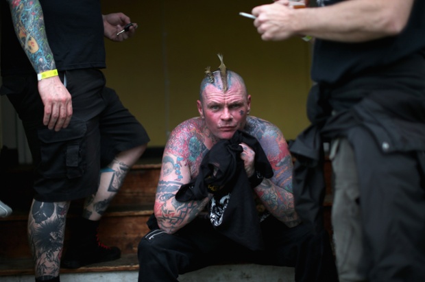 Sean Innocent of the band Vile cools down after playing a gig at the Nice N Sleazy punk music festival in Morecambe.