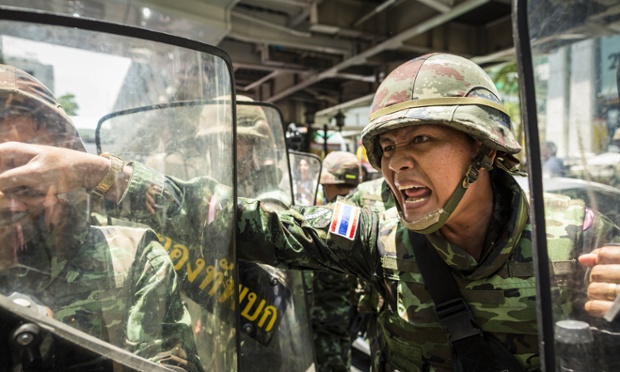 A Thai soldier screams at anti-military protestors during a rally against the coup in Bangkok  Military coup in Thailand - 25 May 2014 plg