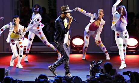 Pharrell Williams performs at GIRL exhibition, Paris