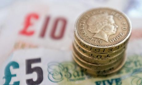 A pile of notes and coins