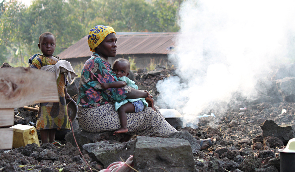 a woman and her children at a camp in DRC