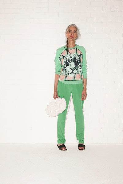 All Ages green: green jumper with tiger on green trousers black slip on shoes