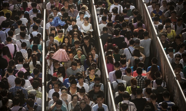 Chinese commuters line-up at a security check to enter a subway station in Beijing, China. Authorities have increased security in many public areas after an attack last week left 31 dead in the restive Xinjiang Province.