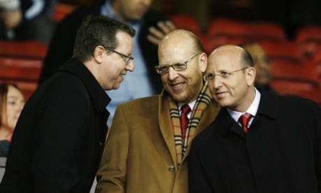 Bryan Glazer, Avi Glazer and Joel Glazer, here at Old Trafford, all have roles in the running of the Tampa Bay Buccaneers and Manchester United.