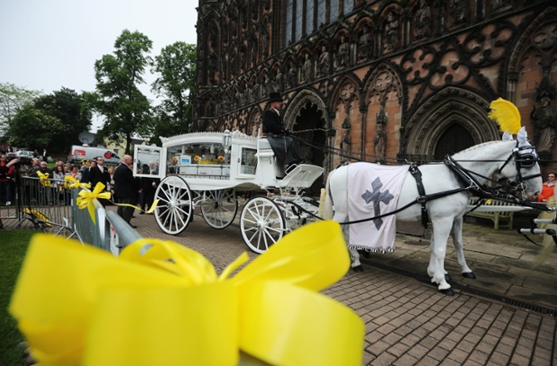 The funeral cortege of Stephen Sutton arrives at Lichfield Cathedral as people attend a vigil in celebration of the life of the teenage fundraiser on. Stephen, aged 19, from Burntwood, Staffordshire, raised more than GBP 4 million for The Teenage Cancer Trust. Stephen died of colorectal cancer on 14 May.