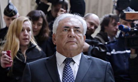 Dominique Strauss-Kahn leaves a Paris courthouse after a hearing last year.