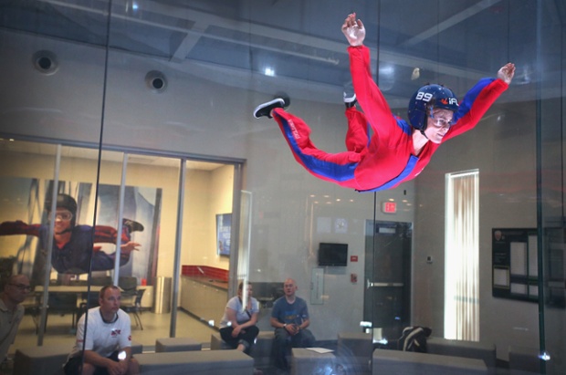 Skydiver Lauren Wilkerson practices wind tunnel flying at the iFly indoor skydiving facility in Rosemont, Illinois. Guests at the facility are introduced to the sensation of free-fall skydiving as they are lifted into the air by fans which generate an upward draft from 80 to 175 miles per hour inside a 14-foot-wide circular chamber.