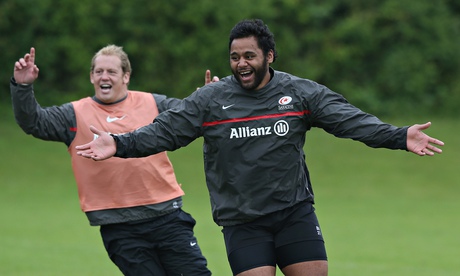 Billy Vunipola and Petrus du Plessis, left, warm up during a Saracens training session at St Albans