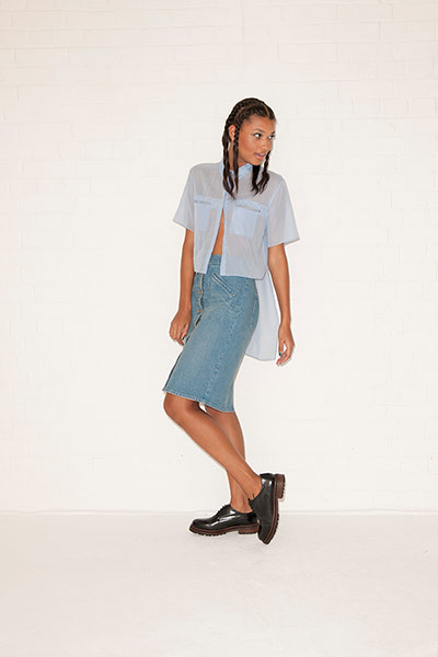 All Ages Shirts: blue short sleeved shirt long back denim skirt black loafers