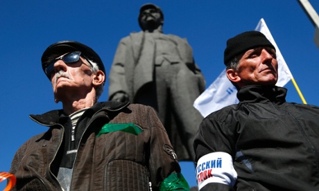A pro Russian rally in Donetsk, eastern Ukraine, with a statue of Lenin in the background.