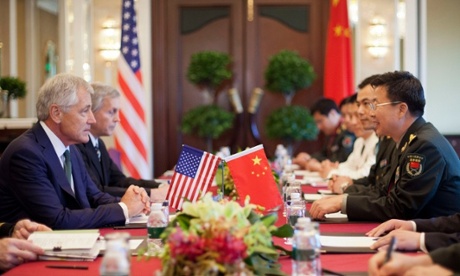 US Defense Secretary Chuck Hagel, left, listens to Lt. Gen. Wang Guanzhong, of China