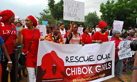 Protestors march to force action over the abducted Nigerian schoolgirls of Chibok on 30 April 2014