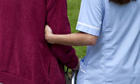 An elderly person with a nurse.