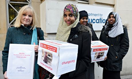 Fahma Mohamed and fellow anti-FGM campaigners deliver a petition to parliament