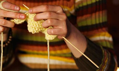 Young woman knitting