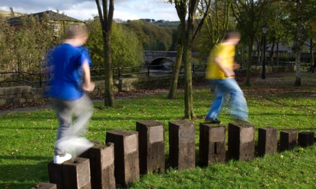 Children play at Irwell Sculpture Trail Ramsbottom, UK