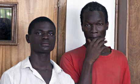 Mukasa Jackson, left, and Mukisa Kim, right, in court in Uganda charged with engaging in gay sex