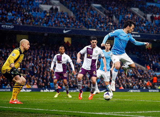 City versus villa: Manchester City's Silva attempts a shot on goal