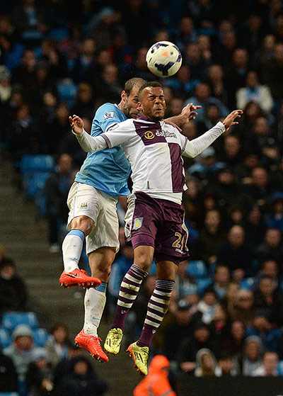 City versus villa: Aston Villa's Ryan Bertrand heads clear