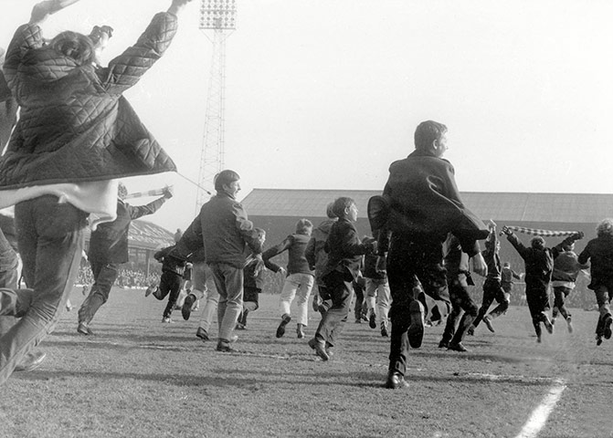 memory lane: Kids invade the pitch after the Blackpool v Derby County game