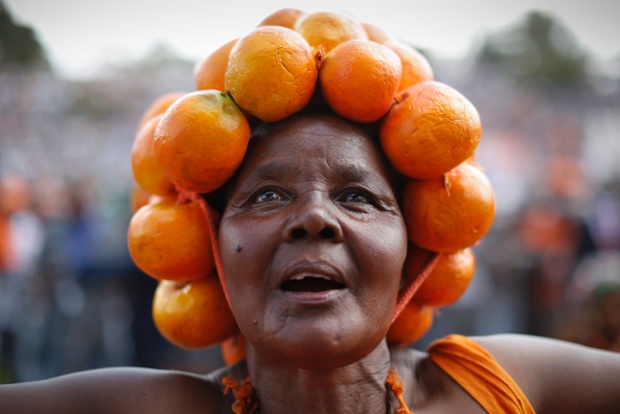 Nairobi, Kenya: A supporter of Raila Odinga, the leader of the Orange Democratic Movement (ODM), listens to Odinga's speech during the rally.