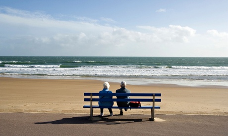 A couple look out to sea