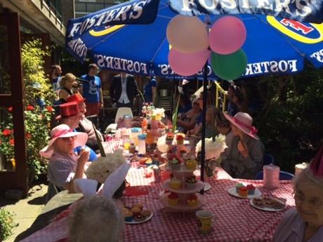 Members of the Great Croft Centre enjoying a Mad Hatter's tea party – Guardian volunteering week 2014
