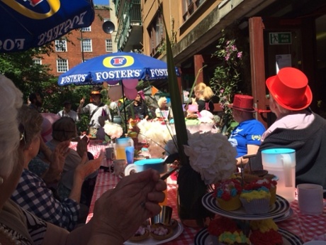 Members of the Great Croft Resource Centre enjoying the Mad Hatter's tea party, Guardian volunteering week 2014