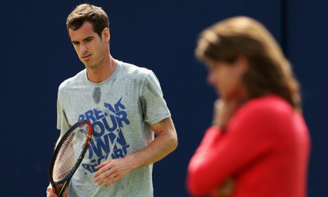 LONDON, ENGLAND - JUNE 12:  Andy Murray of Great Britain warms up on the practice courts watched by his new coach Amelie Mauresmo on day four of the Aegon Championships at Queens Club on June 12, 2014 in London, England.