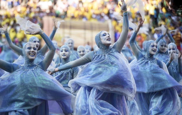 Dancers in blue costumes