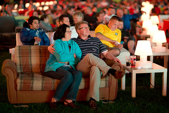 Sofa football: German soccer fans watch the opening game while sitting on sofas