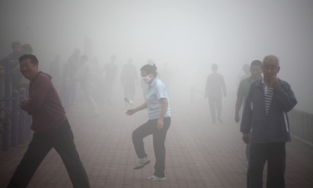 JILIN, CHINA - JUNE 12: (CHINA OUT) A woman does morning excercises near the Songhua River on June 12, 2014 in Jilin, Jilin province of China. Heavy fog hit China's northeast city Jilin with the visibility of no more than 100 meters. (Photo by ChinaFotoPress/ChinaFotoPress via Getty Images) plg  Human Interest