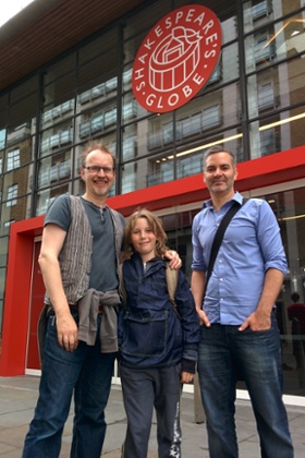 simon blakeman and son william skylark with deafinitely theatre executive director mark sands outside shakespeare's globe theatre in london