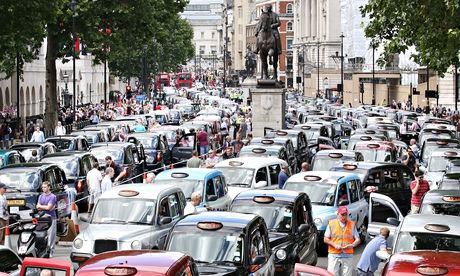 Taxis blockade Whitehall on June 11, 2014 in London, England