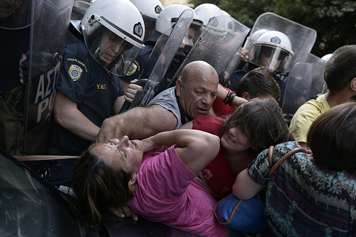20 Photos: Cleaners laid-off by the Finance ministry protest in Athens