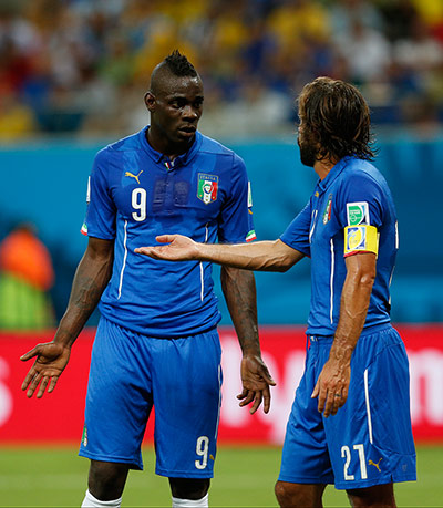 England versus Italy: Mario Balotelli attempts to explain himself to Pirlo 