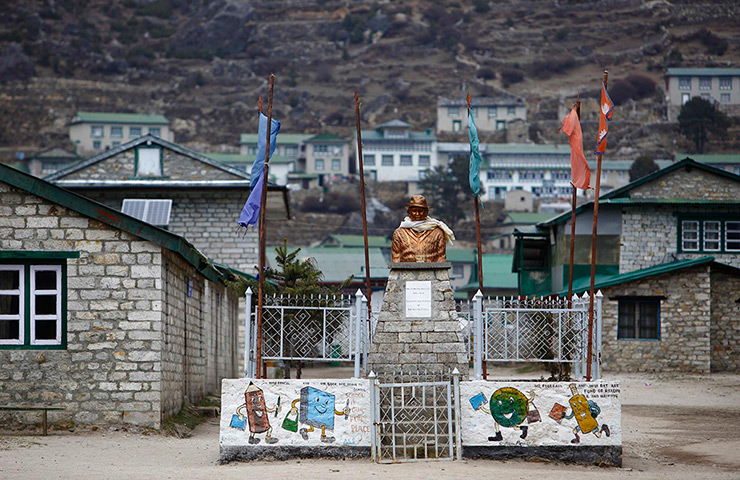 FTA: Ascent to Everest: A statue of Sir Edmund Hillary, the founder of Khumjung High School, in the