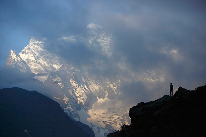 FTA: Ascent to Everest: Porter Lakpa Sherpa stands in front of Mount Kongde