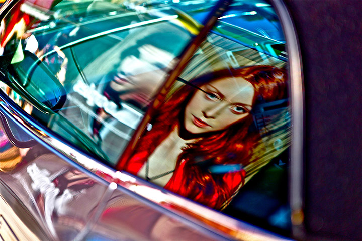 Your Pictures - Vibrant: Girl with Red Hair Reflected in Car