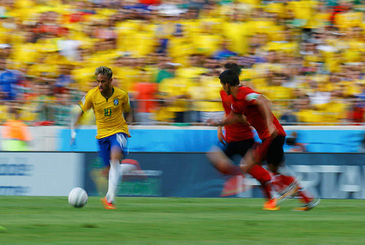 brazil versus mexico: Brazil's Neymar controls the ball 