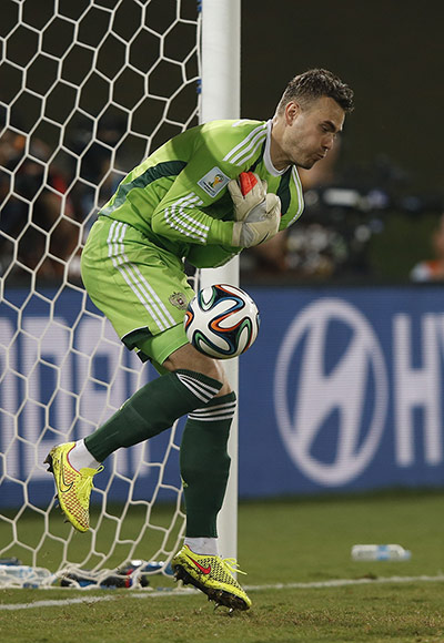 Akinfeevs howlers: Russia's goalkeeper Igor Akinfeev fails to catch the ball