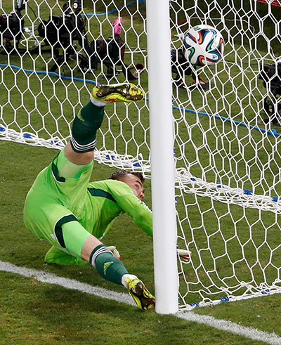 Akinfeevs howlers: South Korea's Lee Keun-ho scores a goal