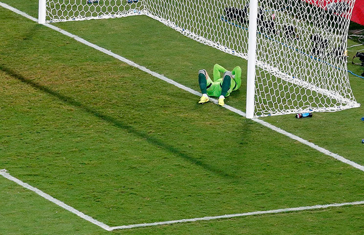 Akinfeevs howlers: Russia's goalkeeper Igor Akinfeev reacts 