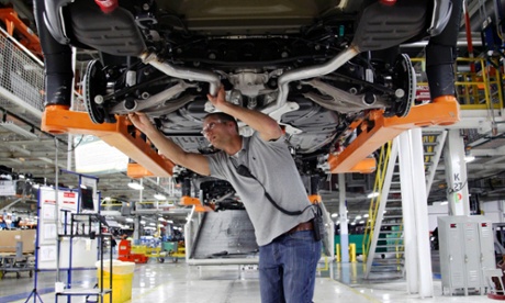 A chassis assembly line supervisor on the assembly line at the Chrysler Jefferson North Assembly plant in Detroit.