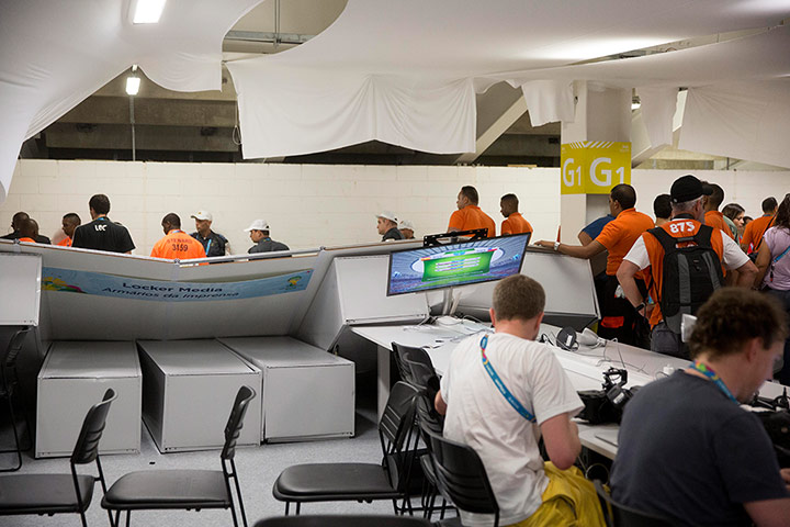 Spain versus Chile: Lockers and a wall pushed over