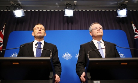 Prime Minister Tony Abbott and Minister for Immigration and Border Protection, Scott Morrison, speak to the media during a joint press conference at Parliament House in Canberra, Thursday, June 19, 2014. The prime minister and the minister for Immigration and Border Protection were discussing Operation Sovereign Borders and marking six months since the last successful people smuggling venture to Australia.