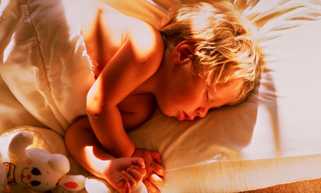 A young boy sleeping