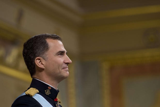 Spain's King Felipe VI stands during a swearing in ceremony.